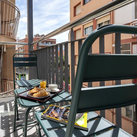 Begin your day with coffee on the balcony