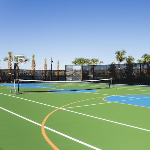 Challenge your loved ones to a friendly game of tennis at the resort