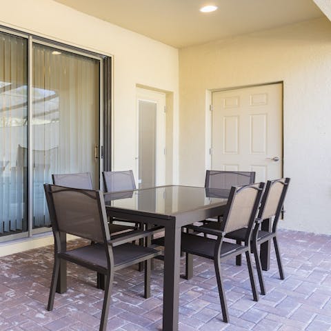 Dine alfresco on the patio after a day seeing the sights