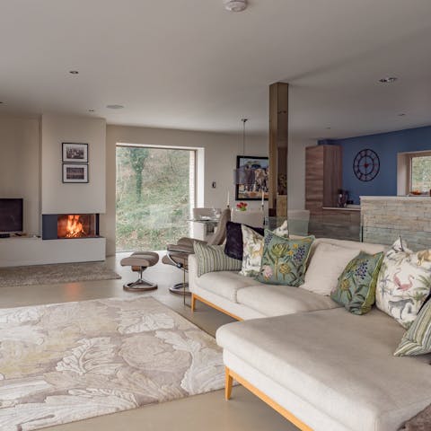 Stretch out on the corner sofa and take in those awe-inspiring views over the Cotswolds