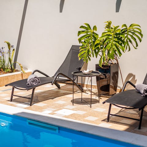 Grab a book and relax by the pool