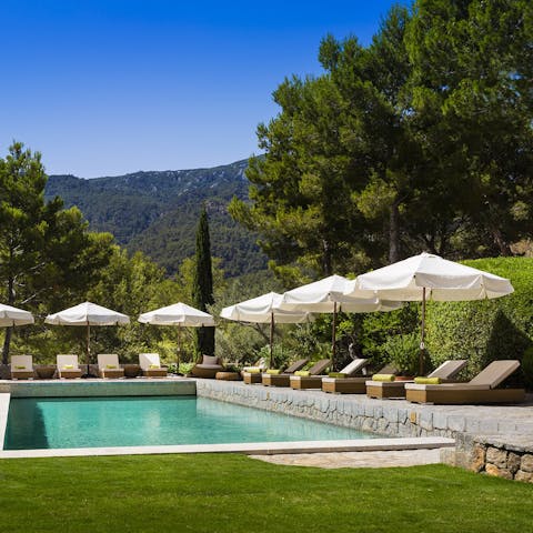 Lounge by the pool under the hot Mallorcan sun