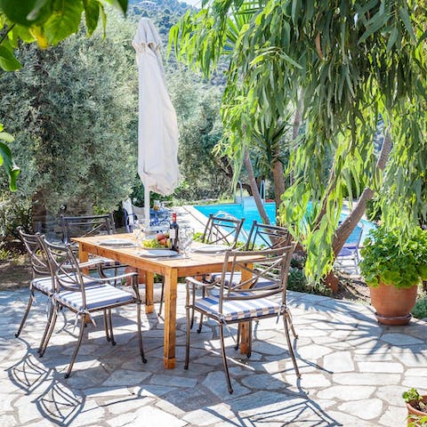 Dine al fresco among lush island greenery
