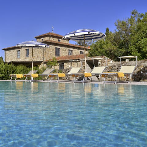 Laze on the sun loungers before cooling off with a dip in your private pool