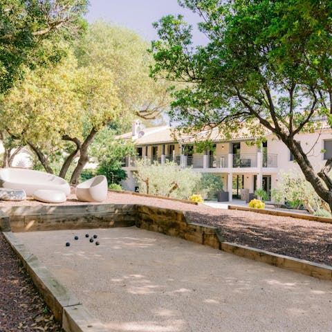 Enjoy a classic game of pétanque in the beautiful garden