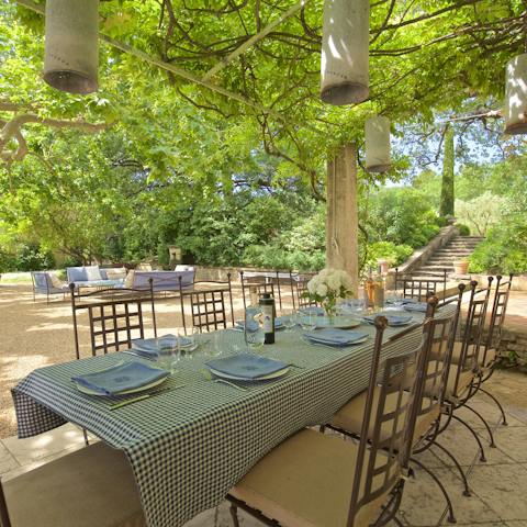 Enjoy a French feast of wine and local delicacies out in the garden