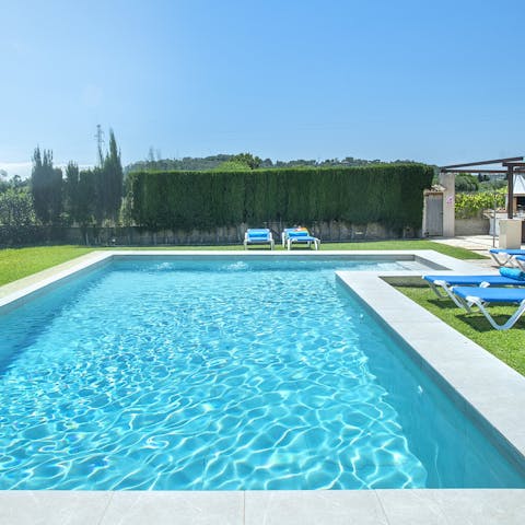 Swim in the sparkling pool as the Spanish sun warms your skin
