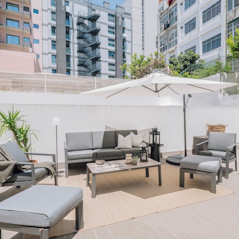 Gather on the terrace for cocktails at sunset