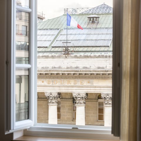 Take in the view of the Palais Brongniart across the street