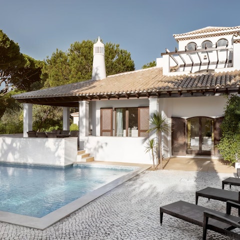 Lounge poolside in the private courtyard or go for a dip in the cool waters