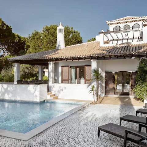 Lounge poolside in the private courtyard or go for a dip in the cool waters