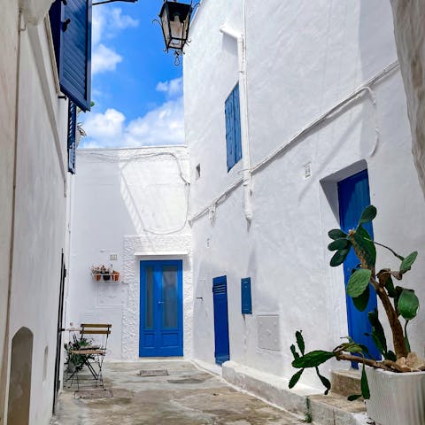 Discover the white streets of Ostuni, a twenty-four minute drive away