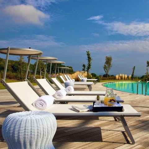 Soak up the sun beside the shared pool