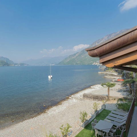 Pad down to the private beach and dip your toes in Lake Como