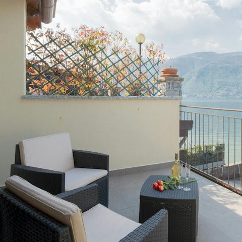 Savour a glass of wine on the waterfront balconies
