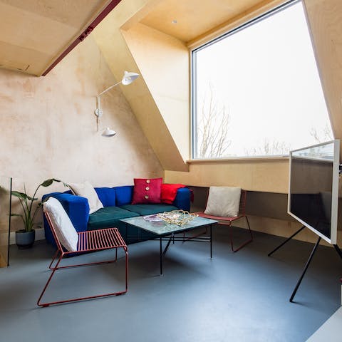 Bask in the natural light bathing the living space and enjoy city views through the large main window