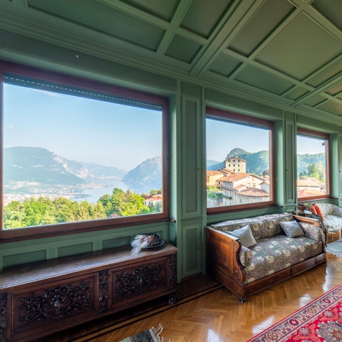 Enjoy panoramic views from the colourful living room