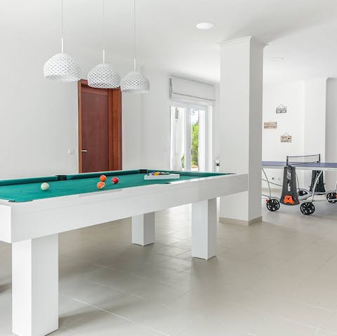 Challenge each other to pool, table football or table tennis in the games area