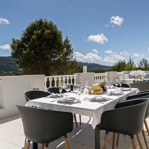Host magnificent alfresco meals overlooking the forest-clad hills