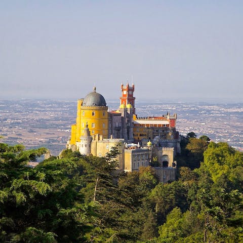 Visit the fairytale-like Palace of Pena in Sintra – a twenty-minute drive down the road