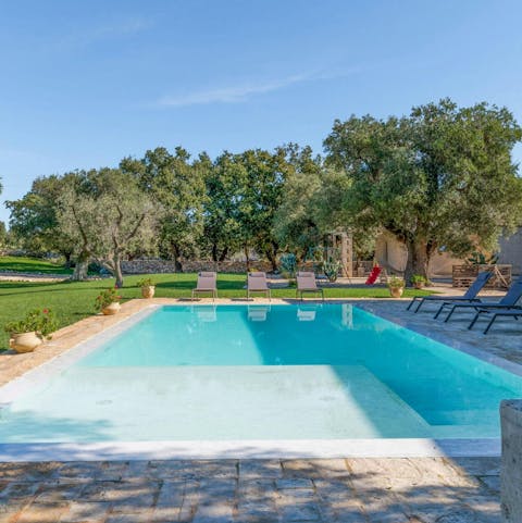 Experience total relaxation while lounging by the pool