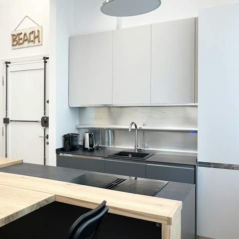 Cook meals in the modern kitchenette