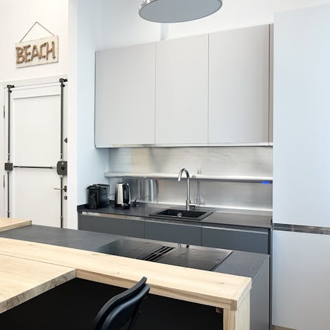 Cook meals in the modern kitchenette