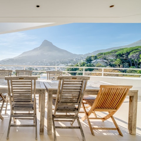 Enjoy a spot of alfresco dining out on the tiled patio area