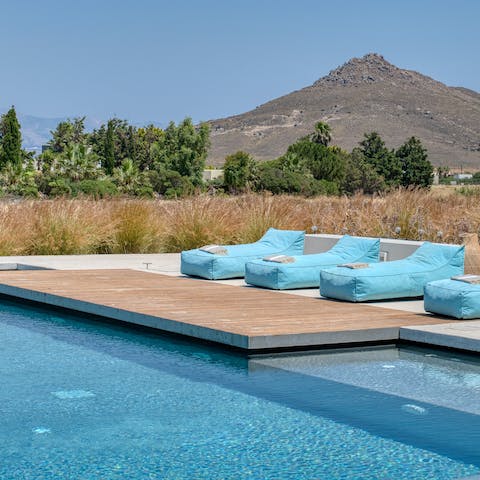 Take in the mountain views from the private pool
