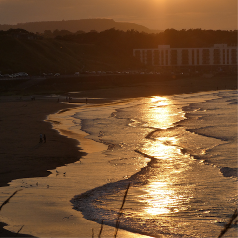 Take a sunset stroll on Scarborough Beach, only minutes away