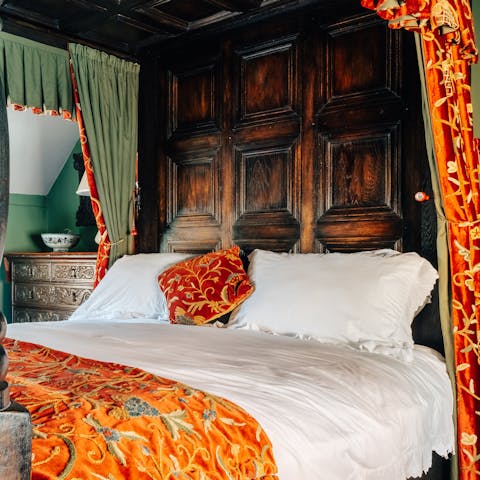 Get some rest in the antique four-poster bed