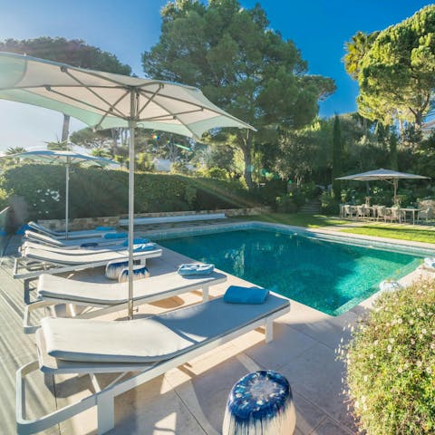 Relax on a lounger by the pool