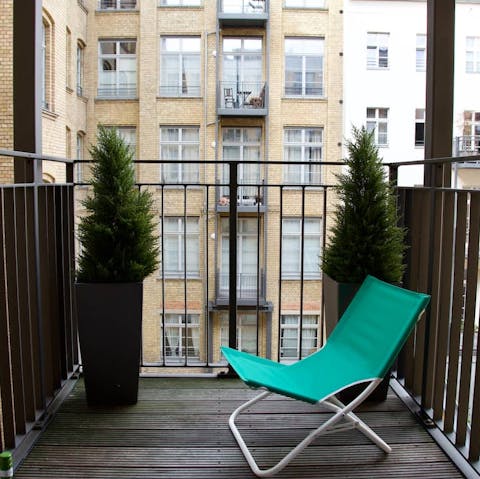 Take your morning coffee out onto the quiet balcony and watch the day go by