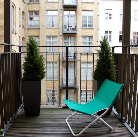 Take your morning coffee out onto the quiet balcony and watch the day go by