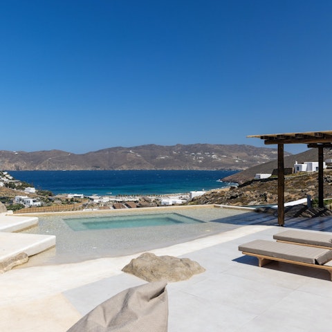 Enjoy incredible views while lounging by the pool