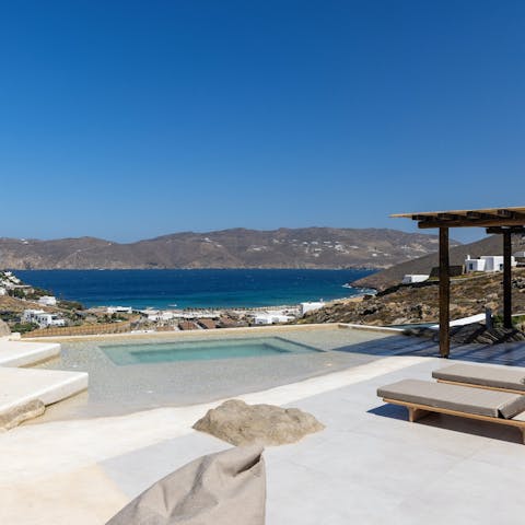 Enjoy incredible views while lounging by the pool