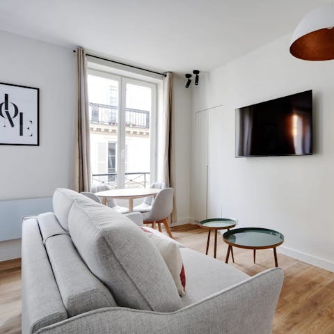 Relax with a glass of French wine in the stylish living room