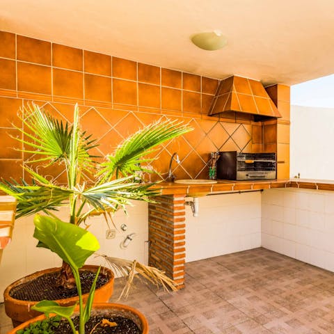 Prepare dinner in the outdoor kitchen – we love a barbecue