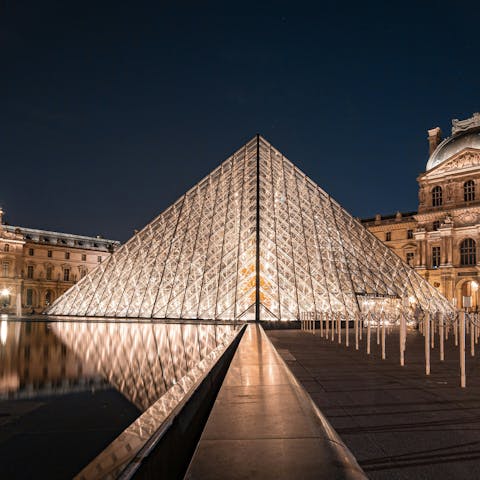 Take a stroll across the Seine to the Louvre Museum