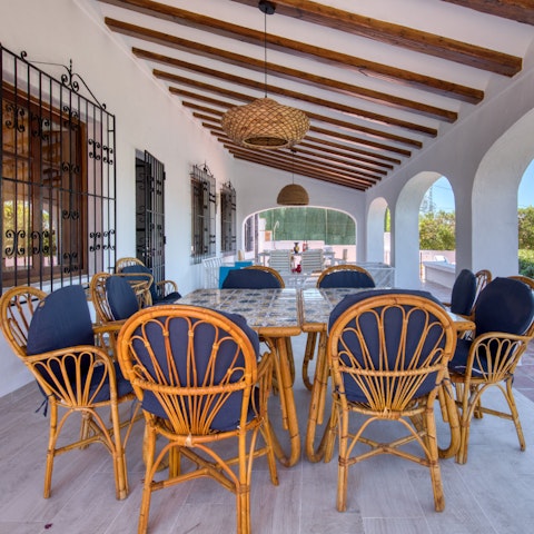 Spend hot afternoons under the shaded dining terrace with a glass of wine