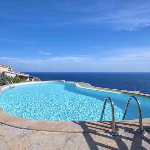 Swim in the pool and admire far-reaching sea views