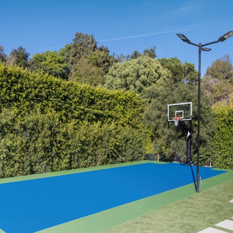 Shoot hoops with friends on the private basketball court
