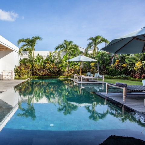 Find peace and relaxation while lounging by the pool