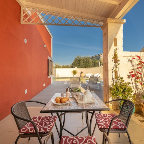 Enjoy breakfast on the shared terrace