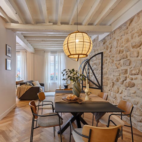 Gather around the dining table for dinner and drinks