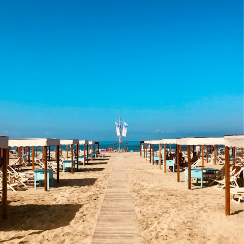 Spend days relaxing on the beach in Viareggio