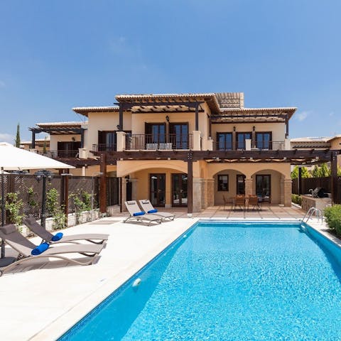 Escape the heat of Paphos in the private pool, or relax on the sun loungers under the shade of the parasol