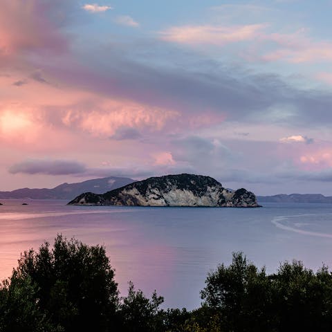 Rent a boat and enjoy an outing to Marathonisi Island, also known as Turtle Island