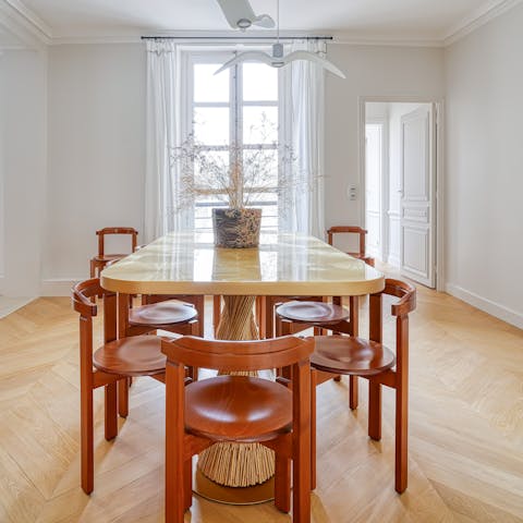 Dine at the handcrafted table with its inlaid rice leaves