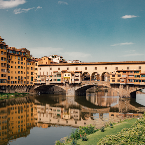 Stroll across Ponte Vecchio with a gelato in hand